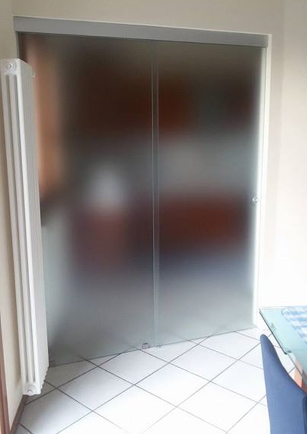 doppia porta in vetro scorrevole battente scrigno eclisse cristallo acidato satinato su misura venezia vetreria veneto spedizione prezzi ristrutturazione